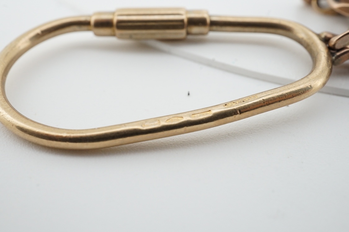 A modern 9ct gold Star of David pendant, diameter 22mm, a 9ct gold St Christopher's pendant on a 9ct chain and an Italian Uno-A-Erre 9k Mercedes insignia keyring, gross weight 22.2 grams.